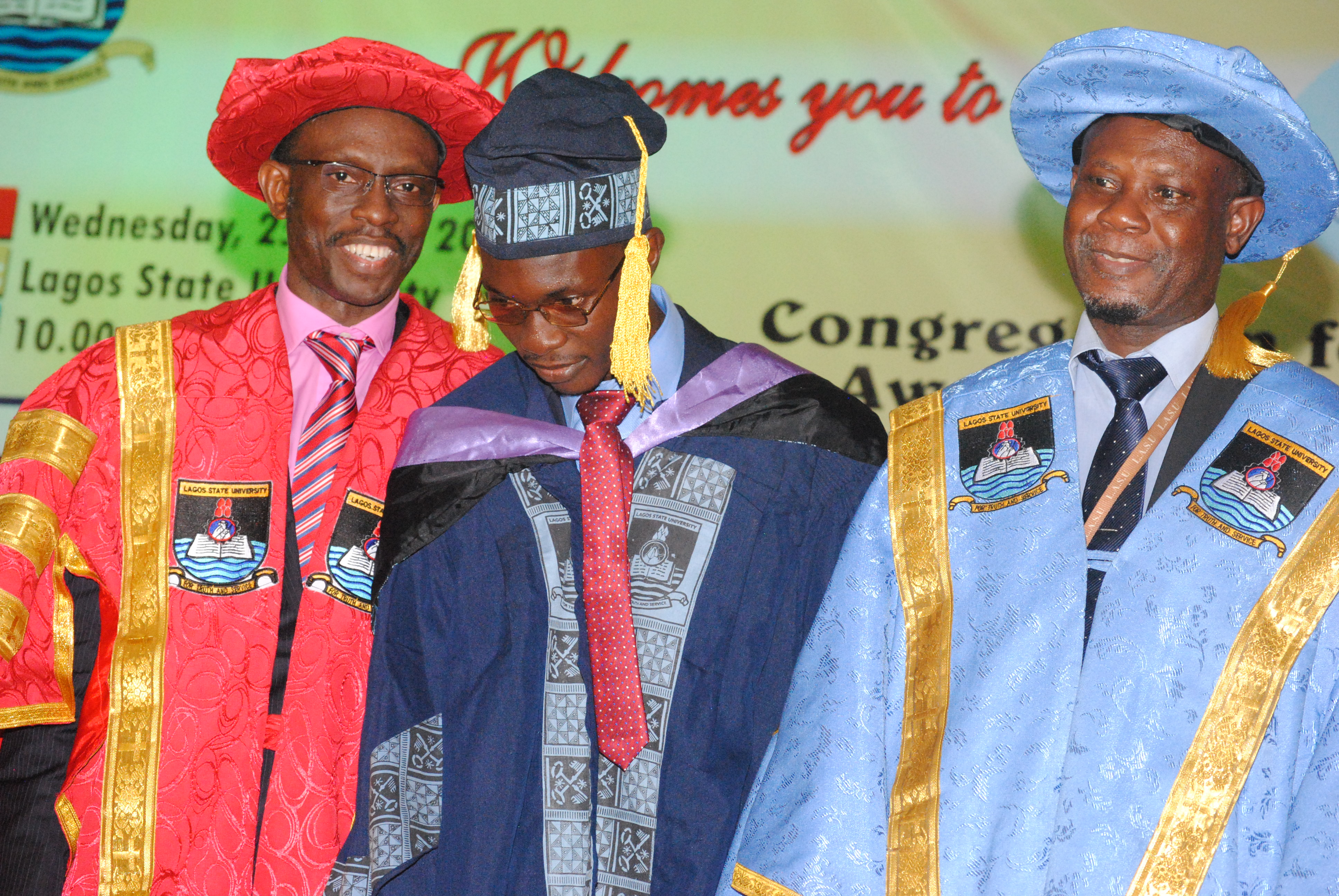 Photos from Lagos State University 20th Convocation Ceremony From left: Vice Chancellor, Lagos State University, Prof. Olanrewa Fagbohun, Overall Best Graduating Student of the Institution, Michael Arowosetgbe and the Bursar, Mr. Adetayo Hassan, during Lagos State University 20th Convocation Ceremony, held at the institution’s premises, Ojo in Lagos. 25/05/2016. Photo